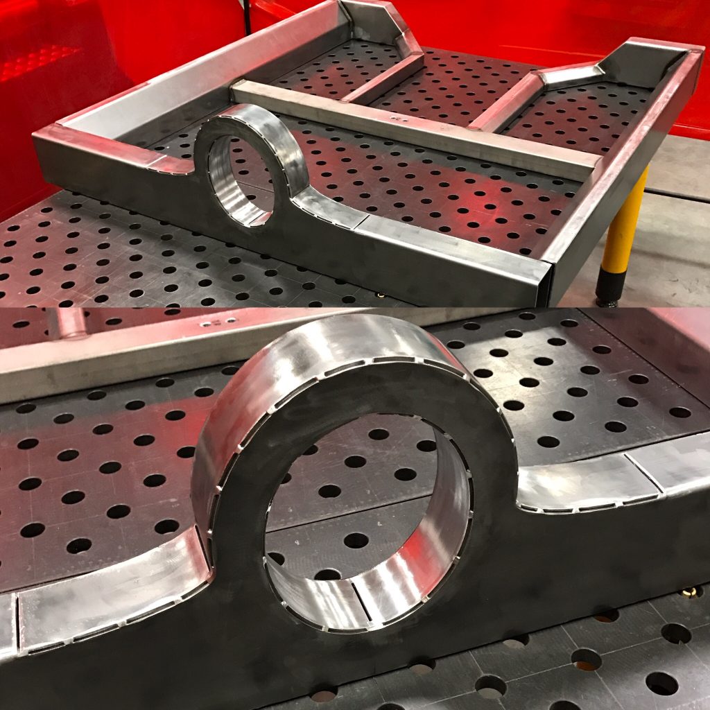 A metal frame with holes on it