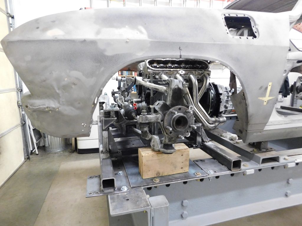 A machine is being worked on in an aircraft factory.