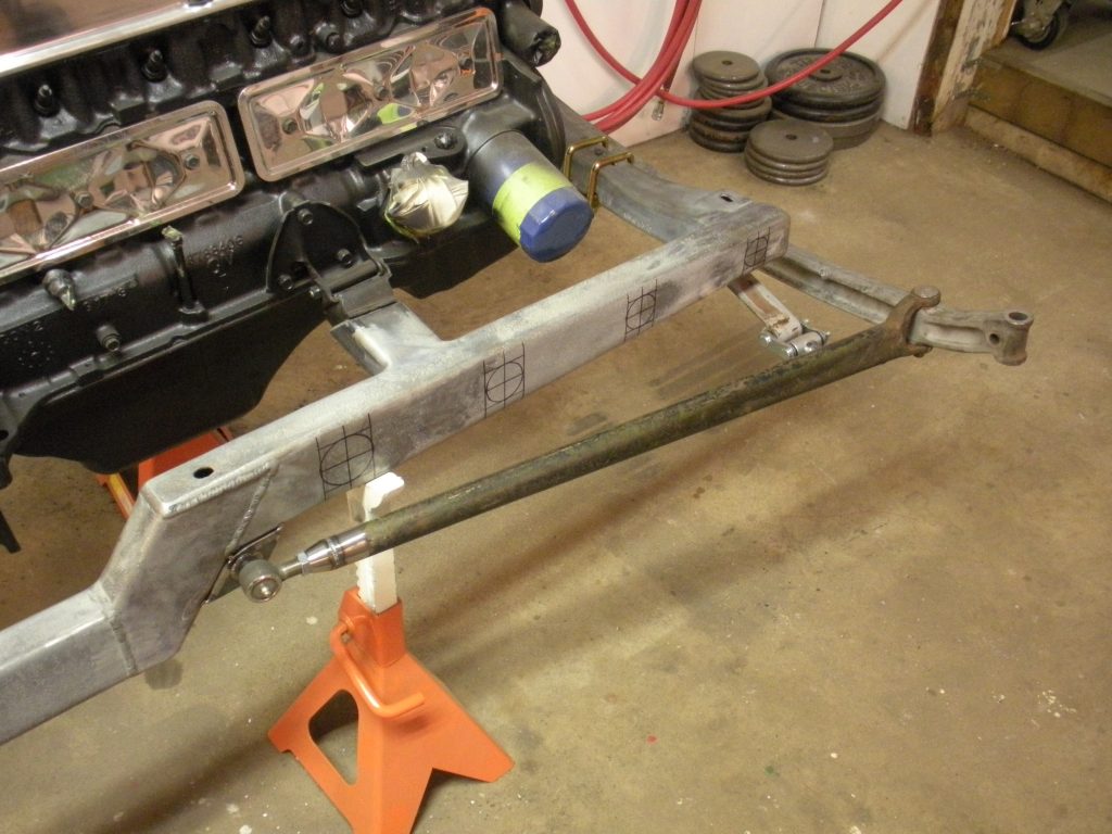 A car engine being worked on in the garage