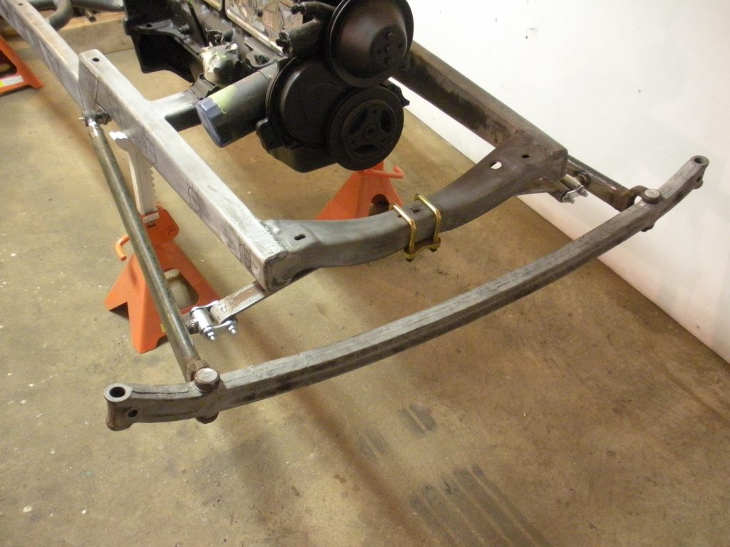 A metal frame with two large springs attached to it.