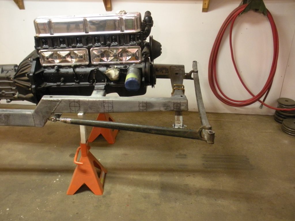 A car engine sitting on top of some stands