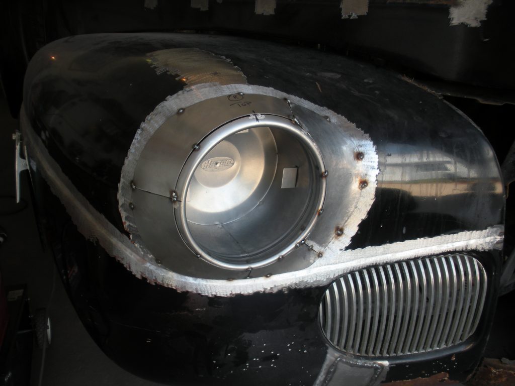 Custom car headlight restoration in progress.