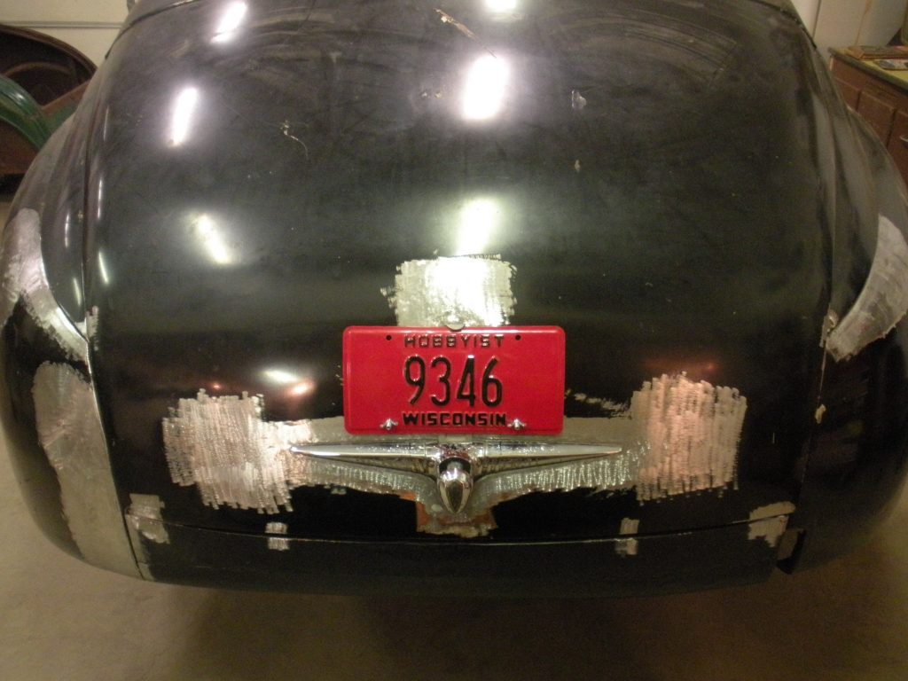 Black car rear, Wisconsin plate 9346.