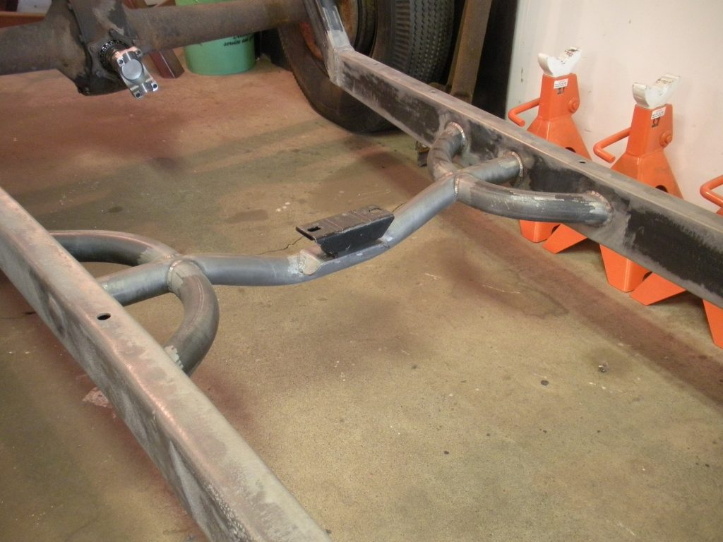 A car frame that has been bent over.