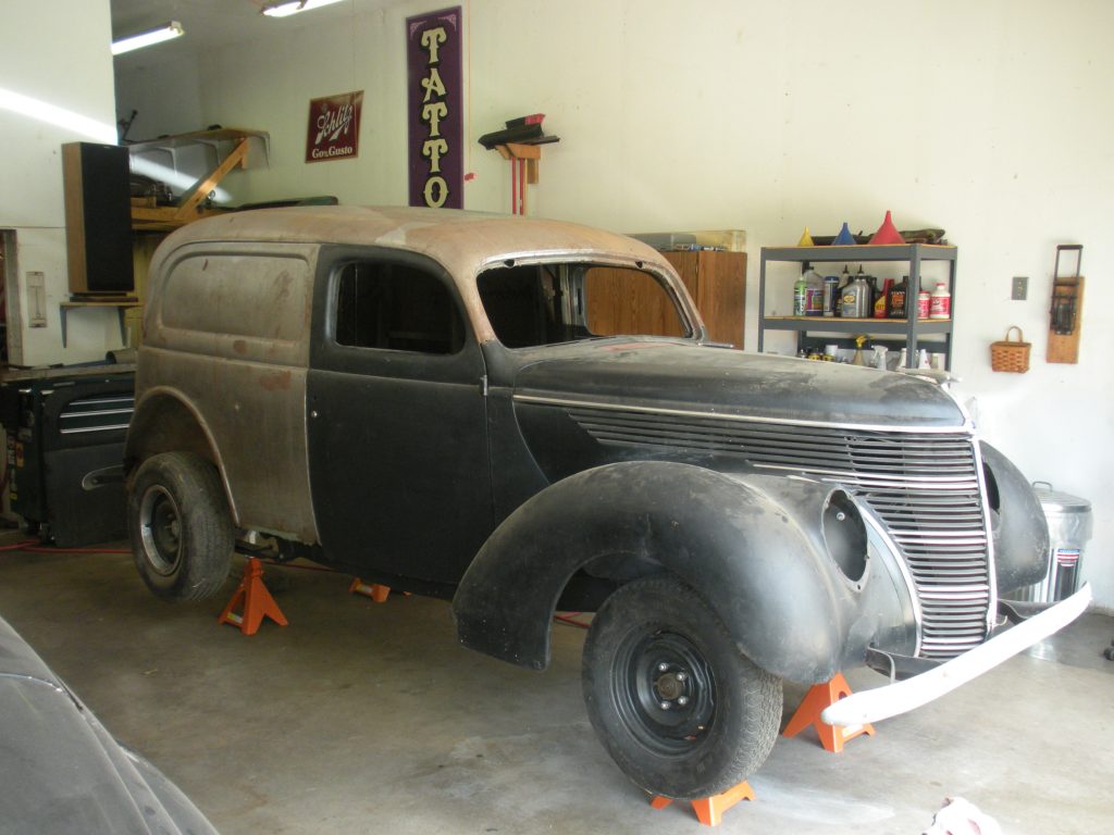 A car that is sitting in the garage.