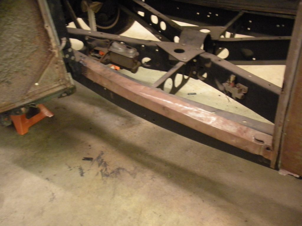 A car that is sitting in the floor.