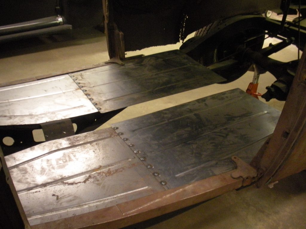 A couple of wooden planks sitting on top of each other.
