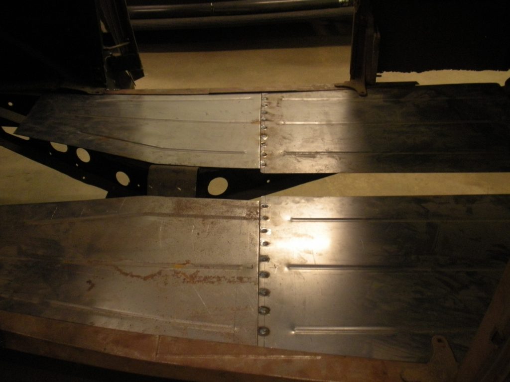 A pair of metal plates on top of a table.