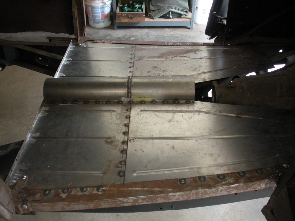A metal machine with some steel plates on it