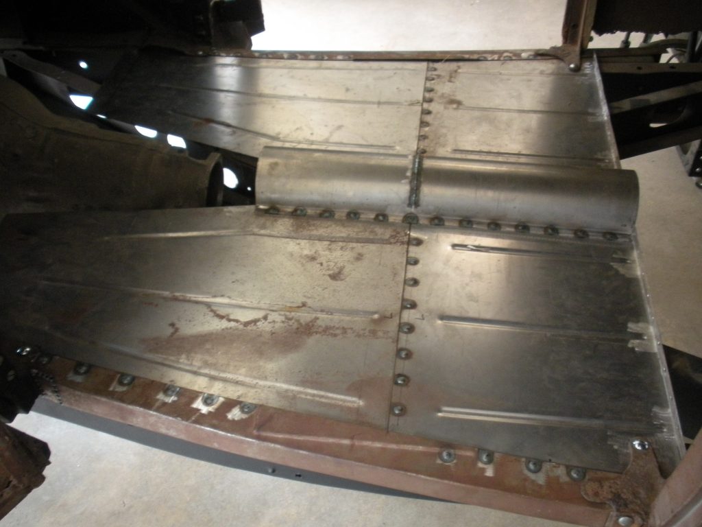 A metal staircase with some rust on it