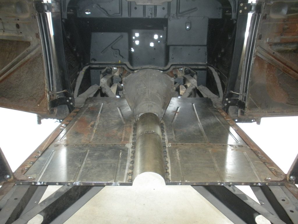 A large metal structure with two pieces of steel.
