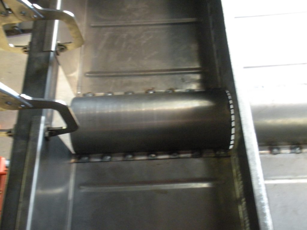 A metal belt is shown going down the stairs.