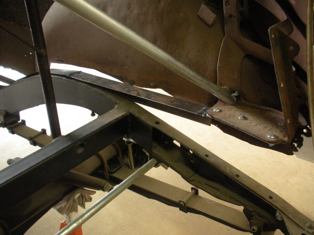A close up of the bottom of an airplane.