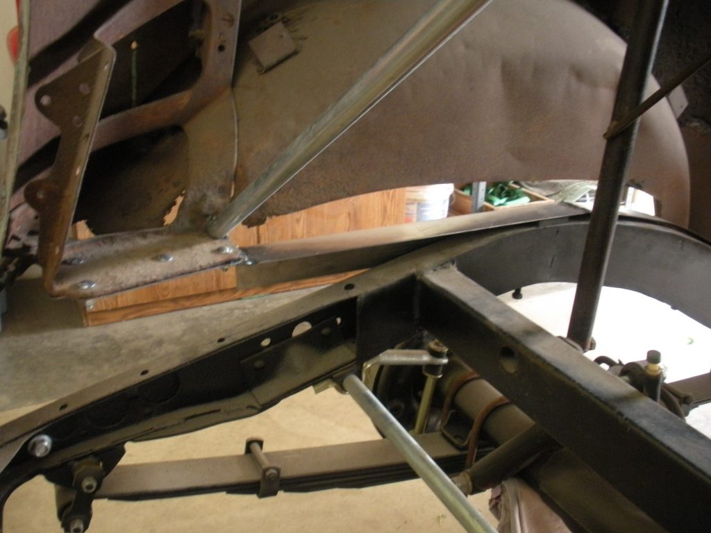 A close up of the bottom part of an airplane.