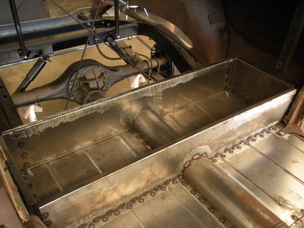 A metal box with some tools inside of it