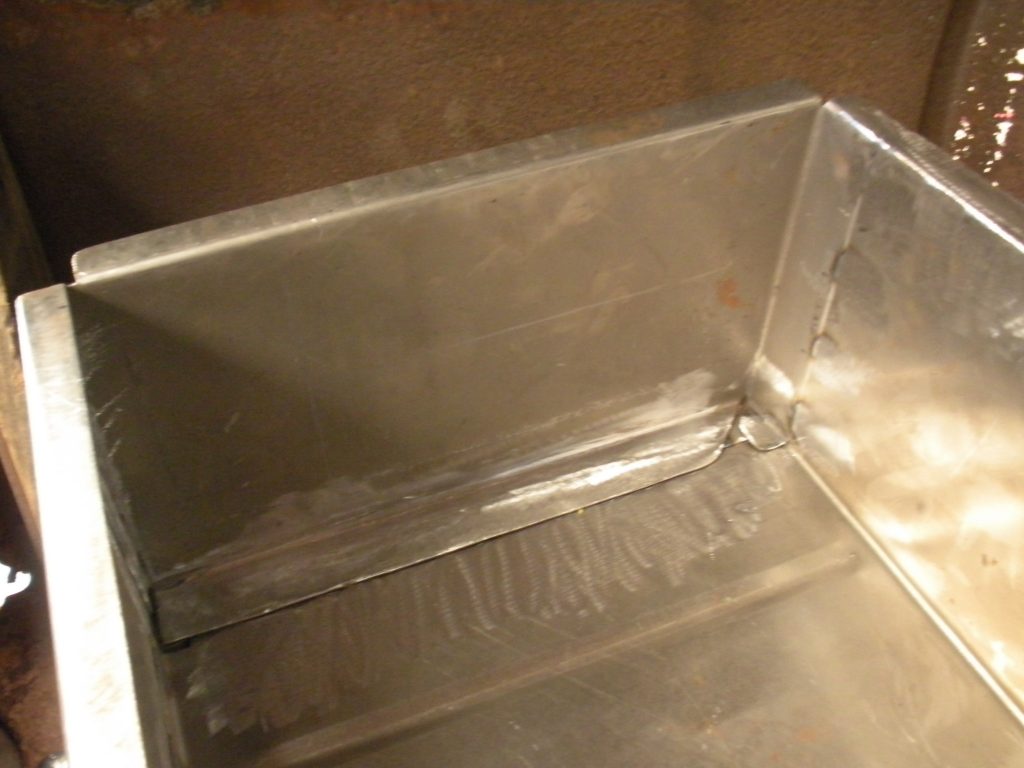 A metal box with some type of plastic on it