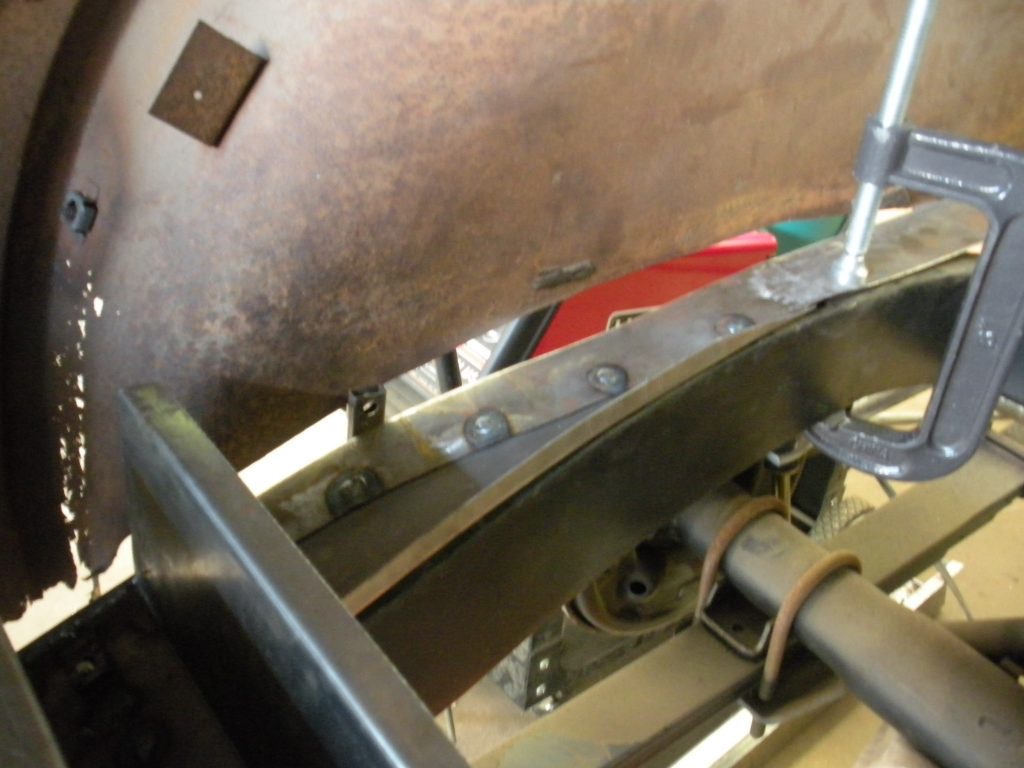 A close up of the metal part on a machine