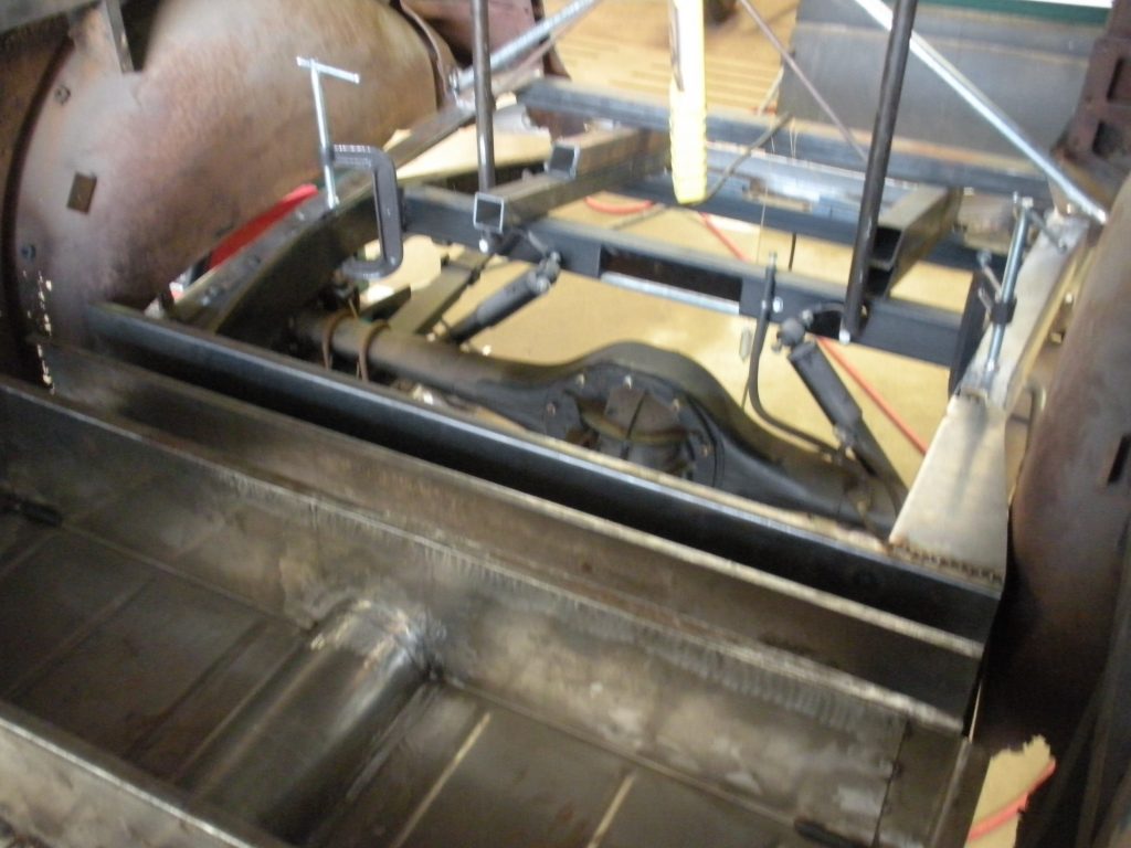 A metal frame with some wires attached to it