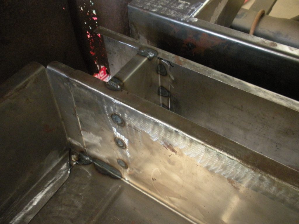 A metal box with some keys on it