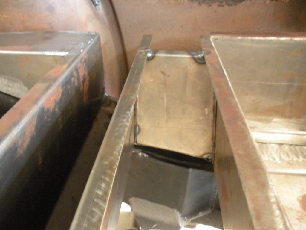 A metal object sitting on top of a floor.