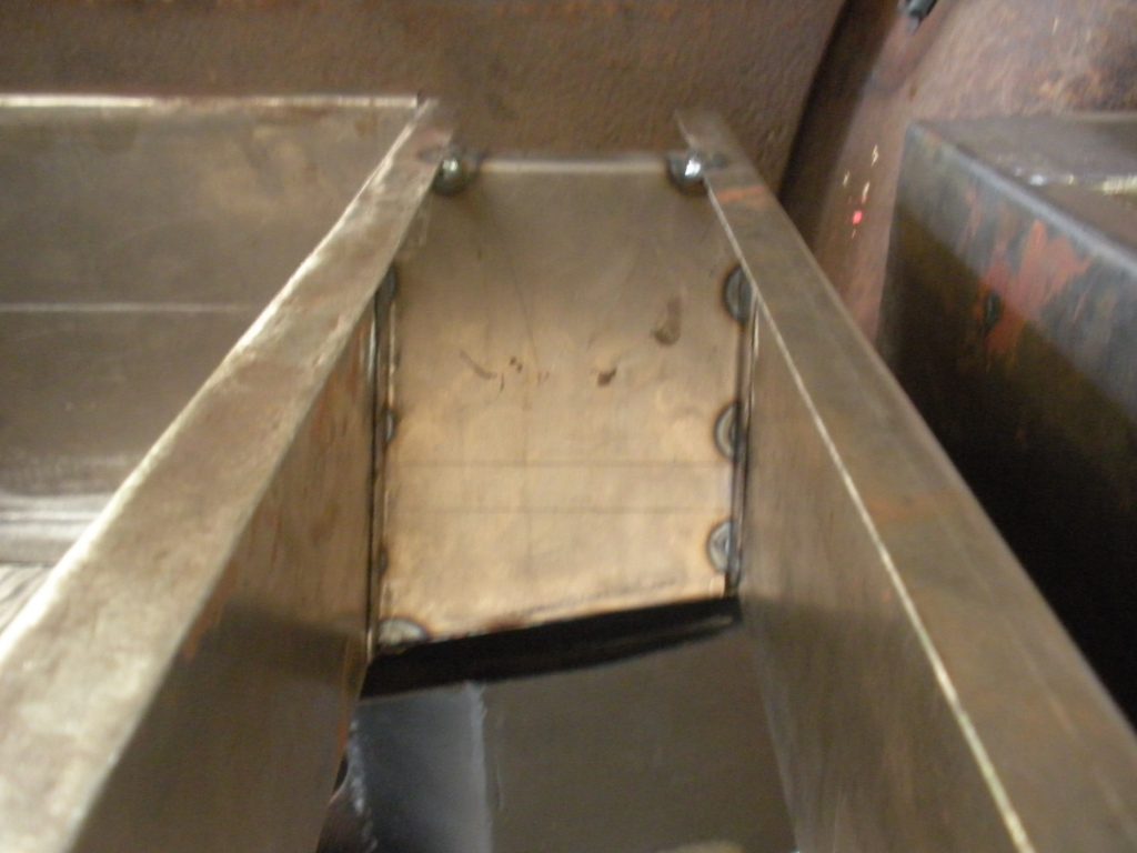 A metal box with some holes in it