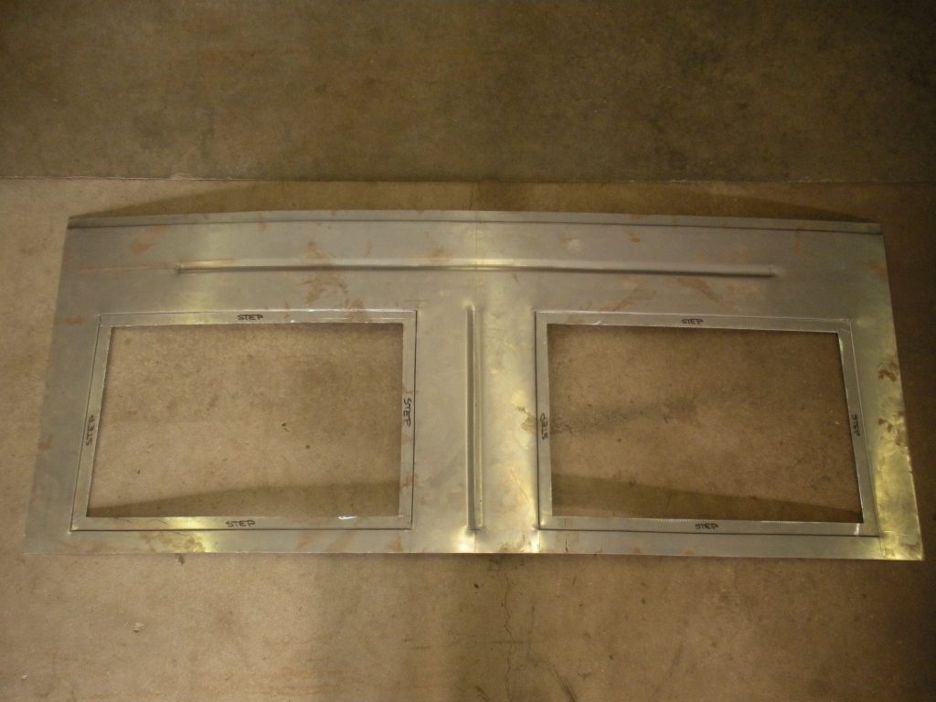 A metal frame with two sections on top of it.