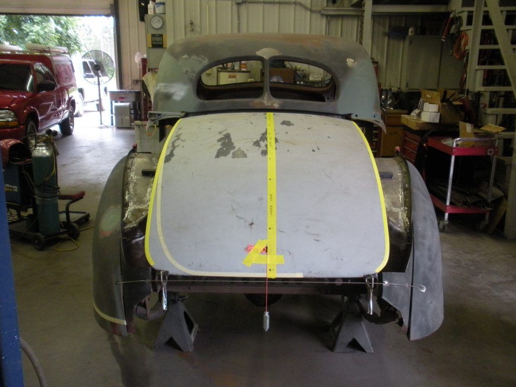 A car that is sitting in the garage.