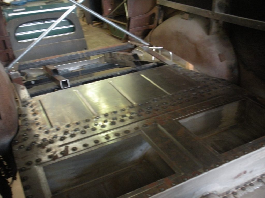 A metal machine with some kind of animal inside it