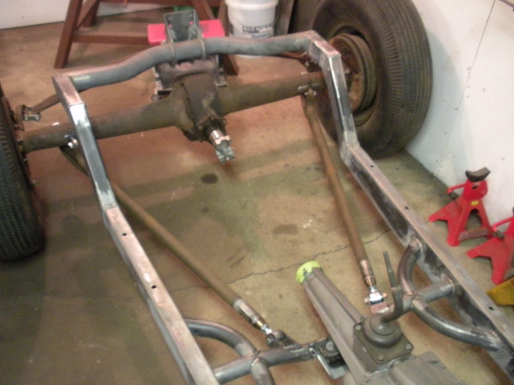 A car frame that has been bent over.