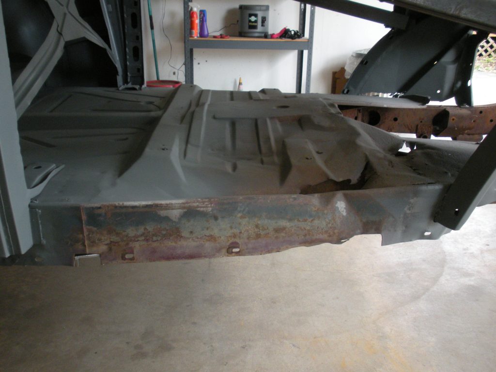 A car frame that is being worked on.