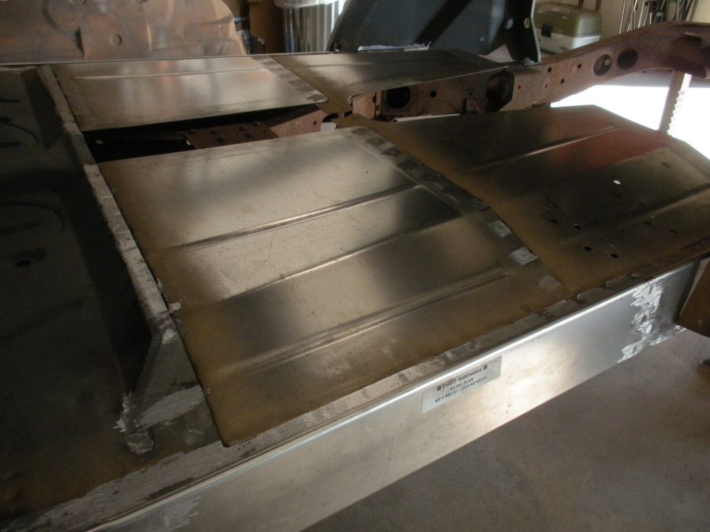 A metal table with some steel plates on it