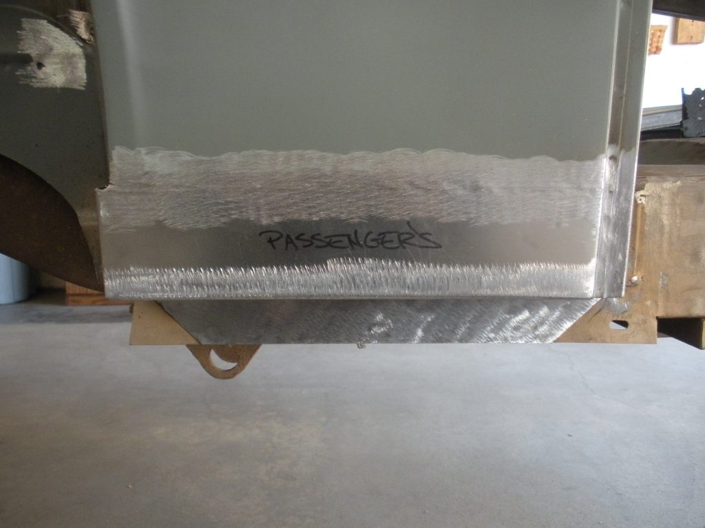 A metal sheet with some writing on it