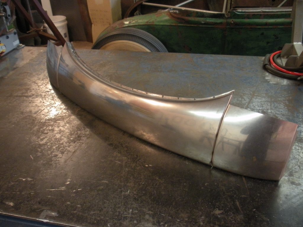 A metal object sitting on top of a table.