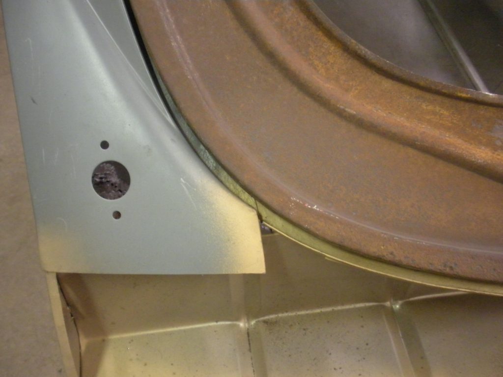 A close up of the corner of a kitchen sink