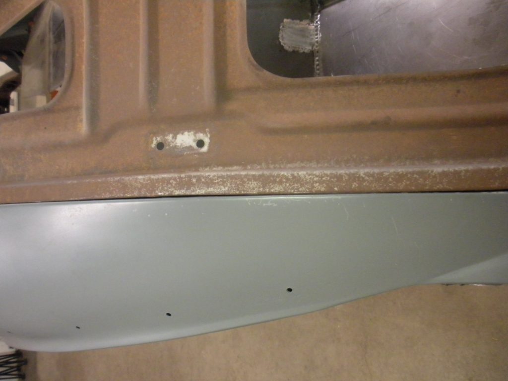 A close up of the door handle on a car.