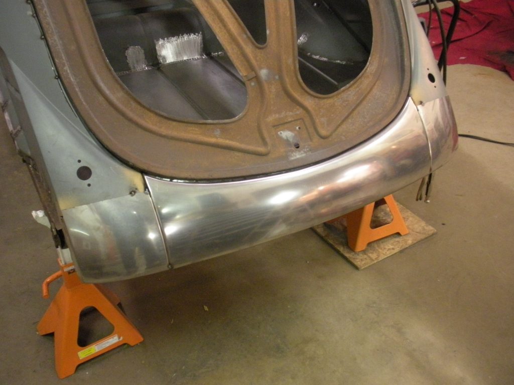 A car that is sitting in the floor.