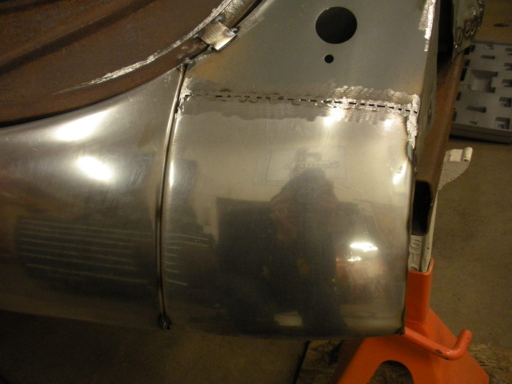 A close up of the side of an airplane.