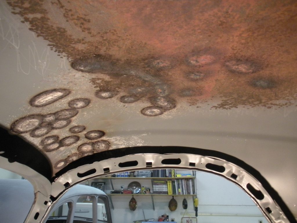 A view of the ceiling from inside a vehicle.