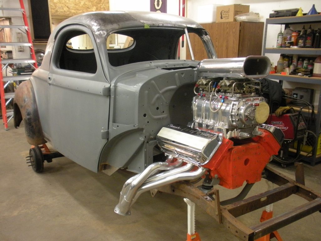 A car that is being worked on in the shop.