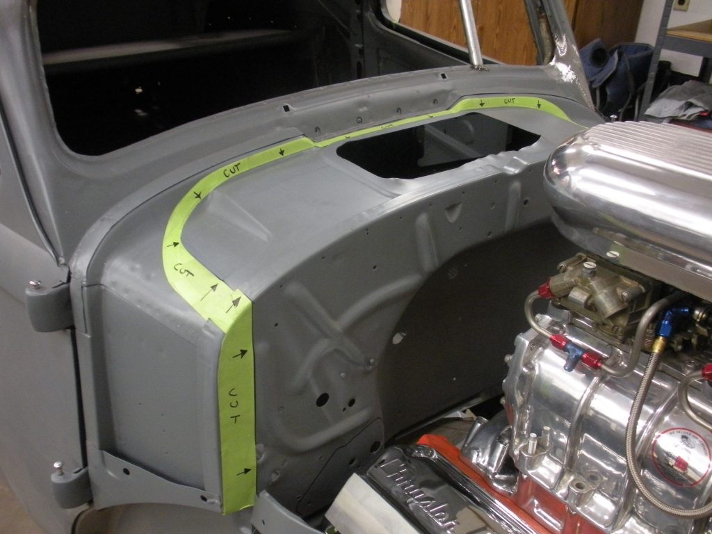 A car that is being worked on.