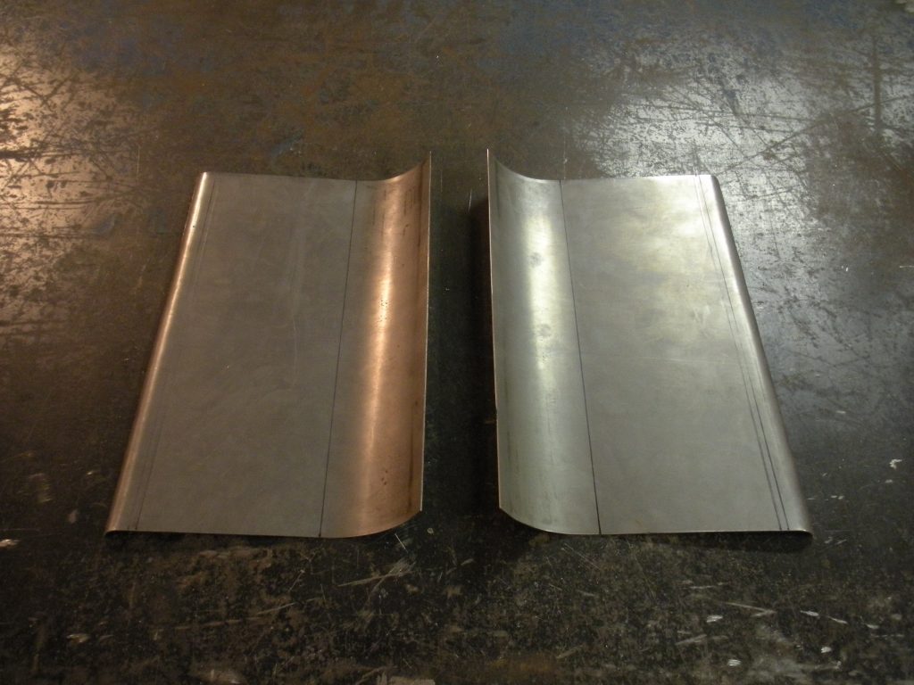 Two metal sheets that are next to each other.