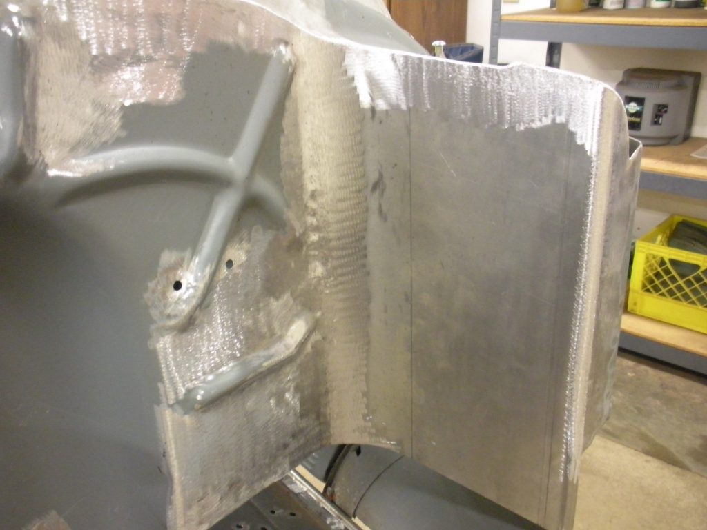 A piece of metal with paint on it.