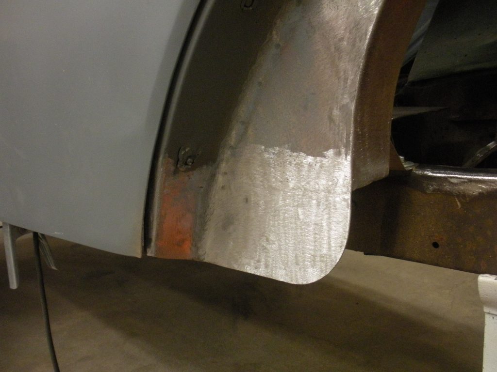 A close up of the side of a car door.