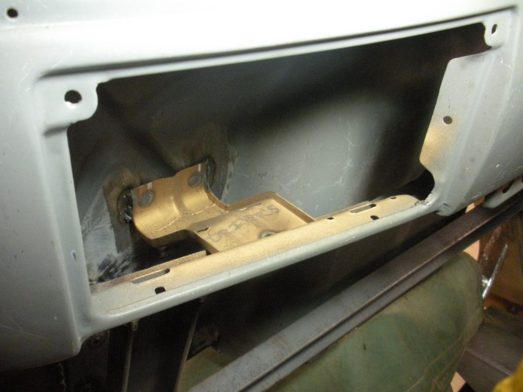 A metal box with some gold bars inside of it