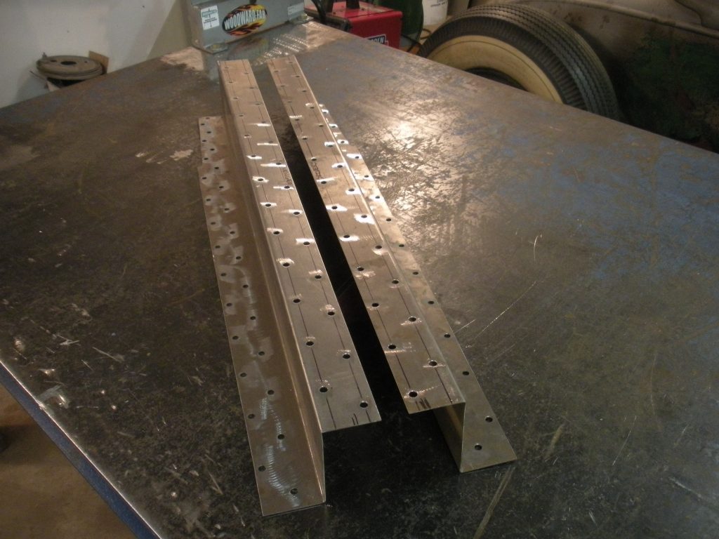 A metal piece of construction is sitting on the table.