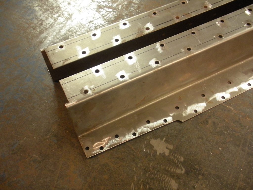 A metal structure with holes in it