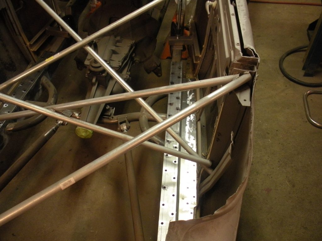 A close up of the bottom of an airplane.