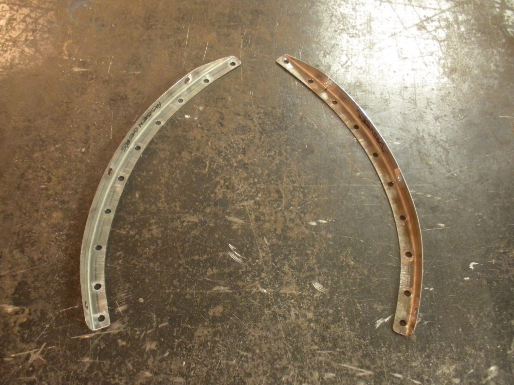 A pair of metal pieces that are bent to make a curve.