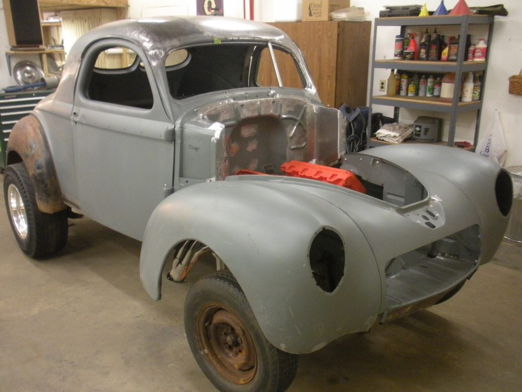A car that is sitting in the garage.