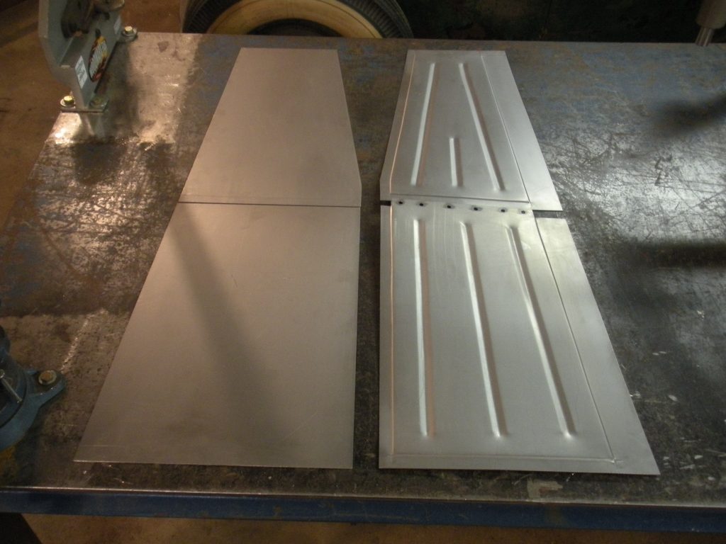 A table with two metal panels on it